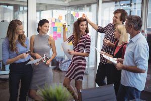 business-people-planning-strategies-in-creative-office-e1640485259136.jpg